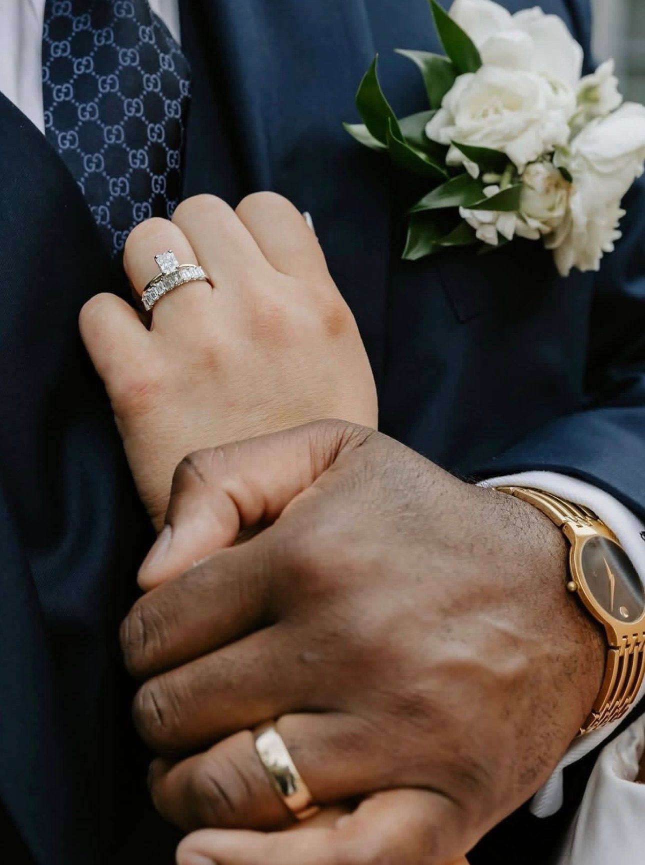 A wedding band stacked flush with an engagement ring, paired at Homsy Jewelers Boston