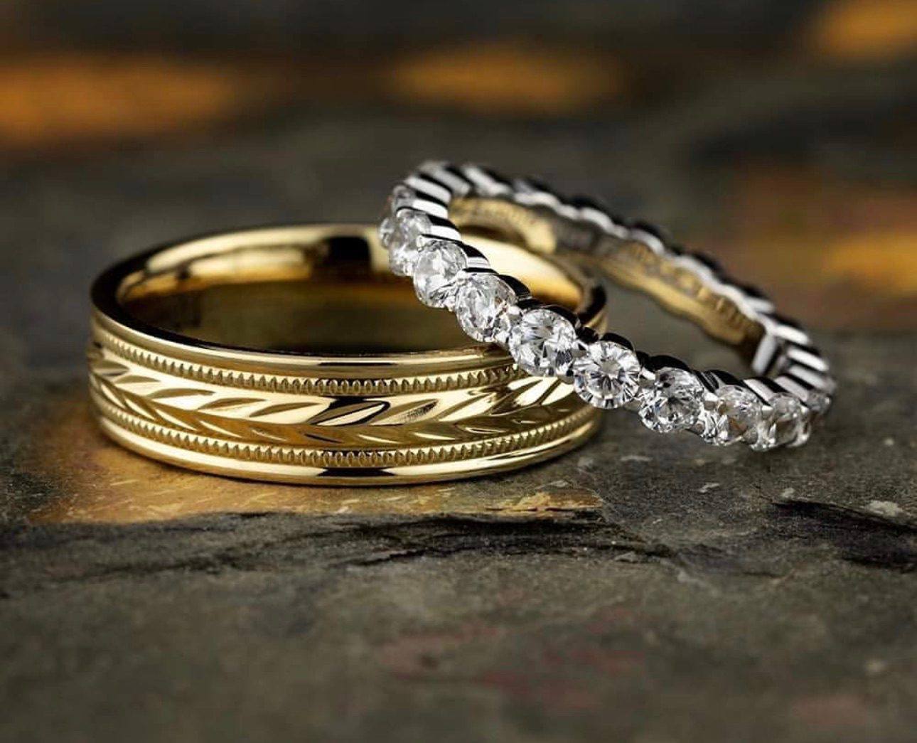 Pair of gold wedding bands handcrafted at Homsy Jewelers Boston