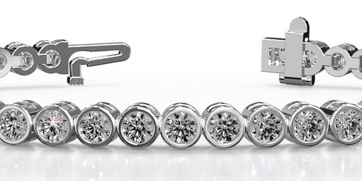 Birdie Bracelet, full bezel setting, each diamond fully wrapped in metal, by Homsy Jewelers Boston