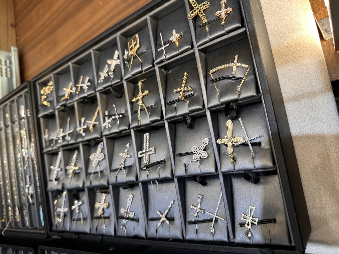 Gold and diamond cross pendants at Homsy Jewelers Boston