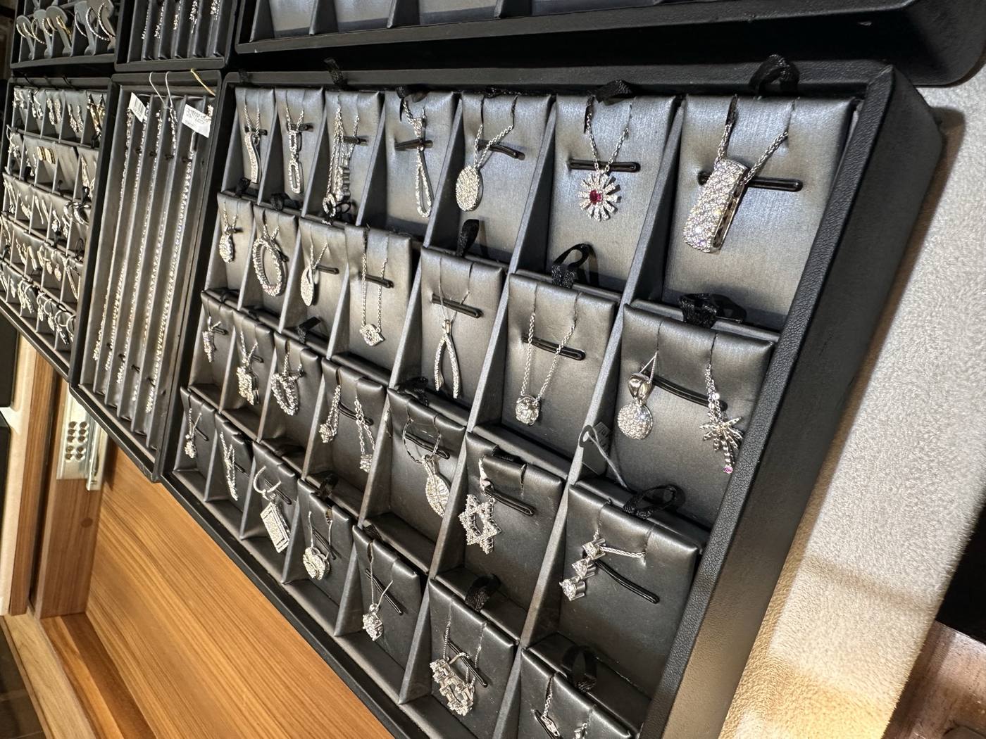 Silver and diamond pendant case at Homsy Jewelers Boston